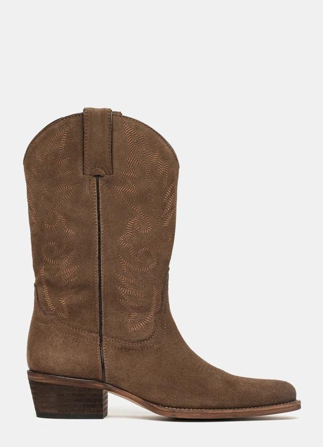 Bottes de cowboy en cuir marron de ses chaussures, 274,95 euros.